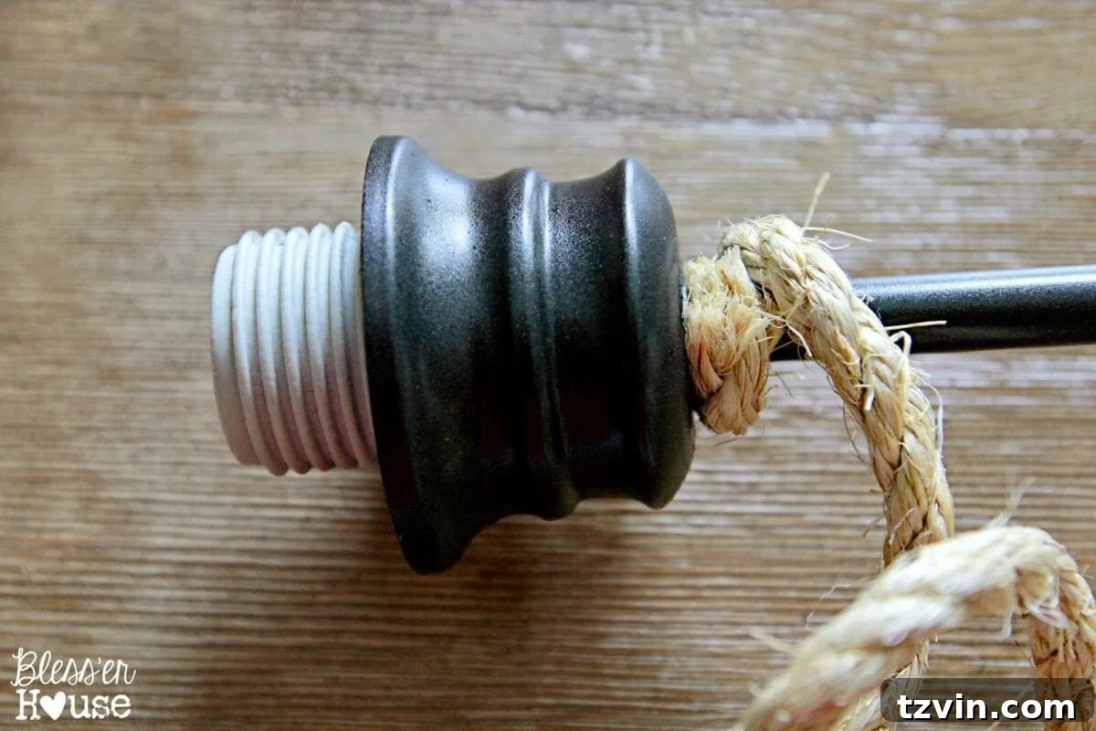 Wrapping the pendant downrod with sisal rope