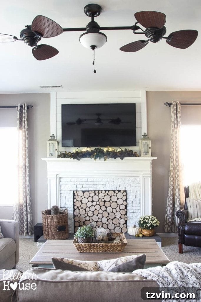 Our $600 Faux Fireplace Transformation Revealed 11 DIY faux fireplace in a cozy living room setting