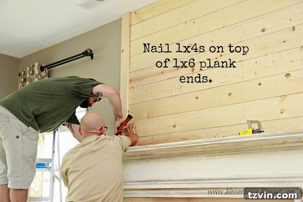 Adding vertical 1x4 pine planks to finish the side edges of the newly installed accent wall, providing a clean border.