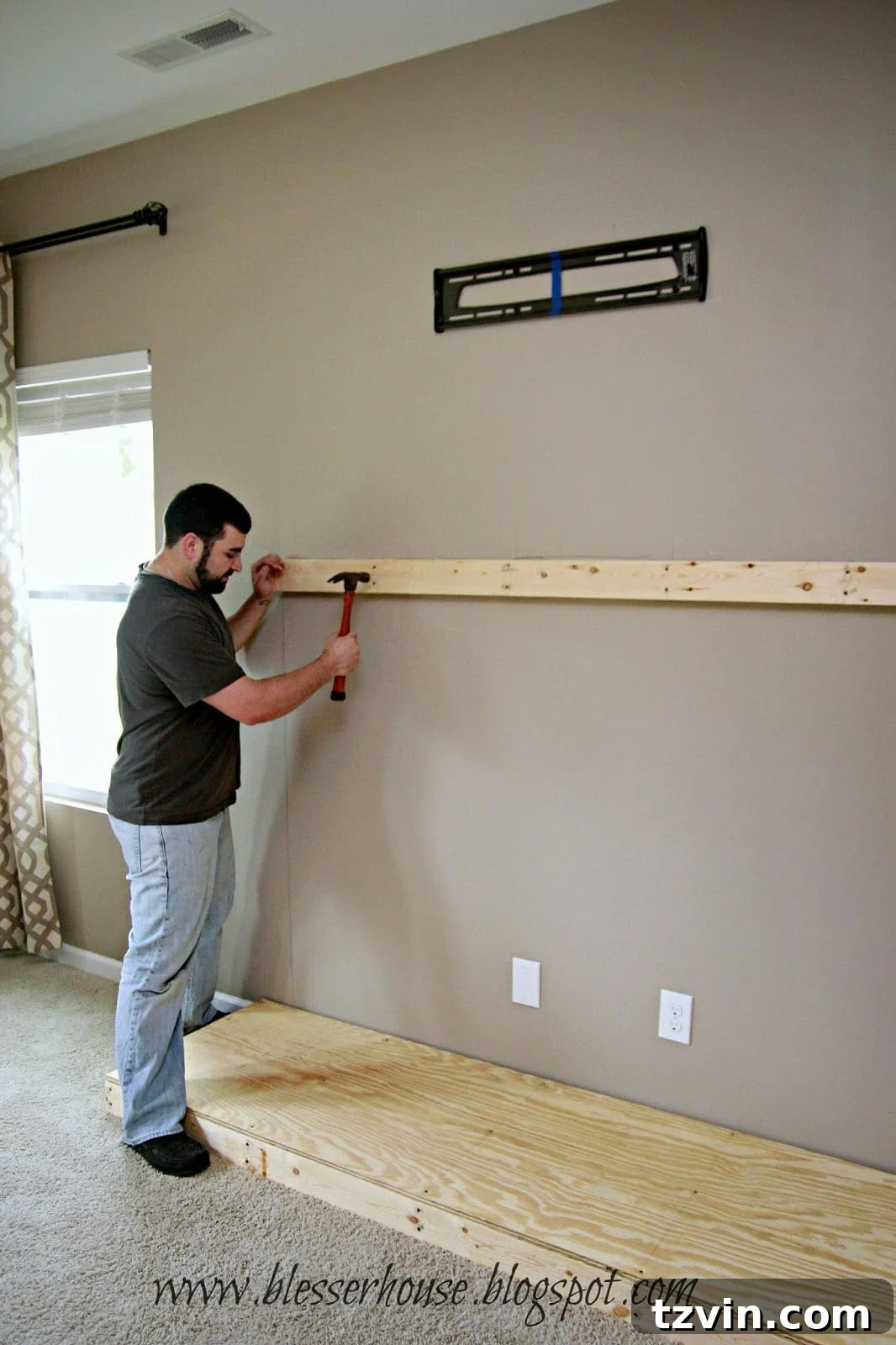 2x4s nailed to the wall, positioned for mantel attachment