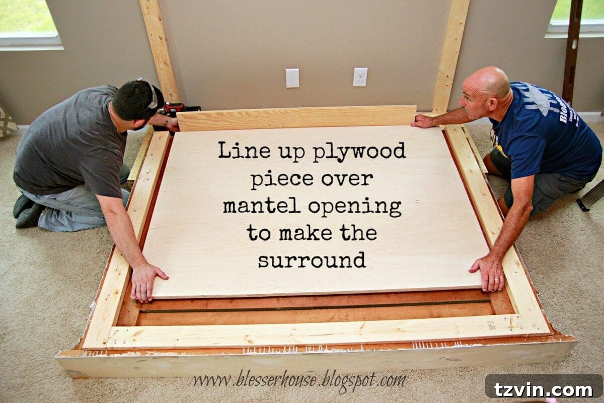 Plywood sheet covering the mantel opening to form the firebox surround