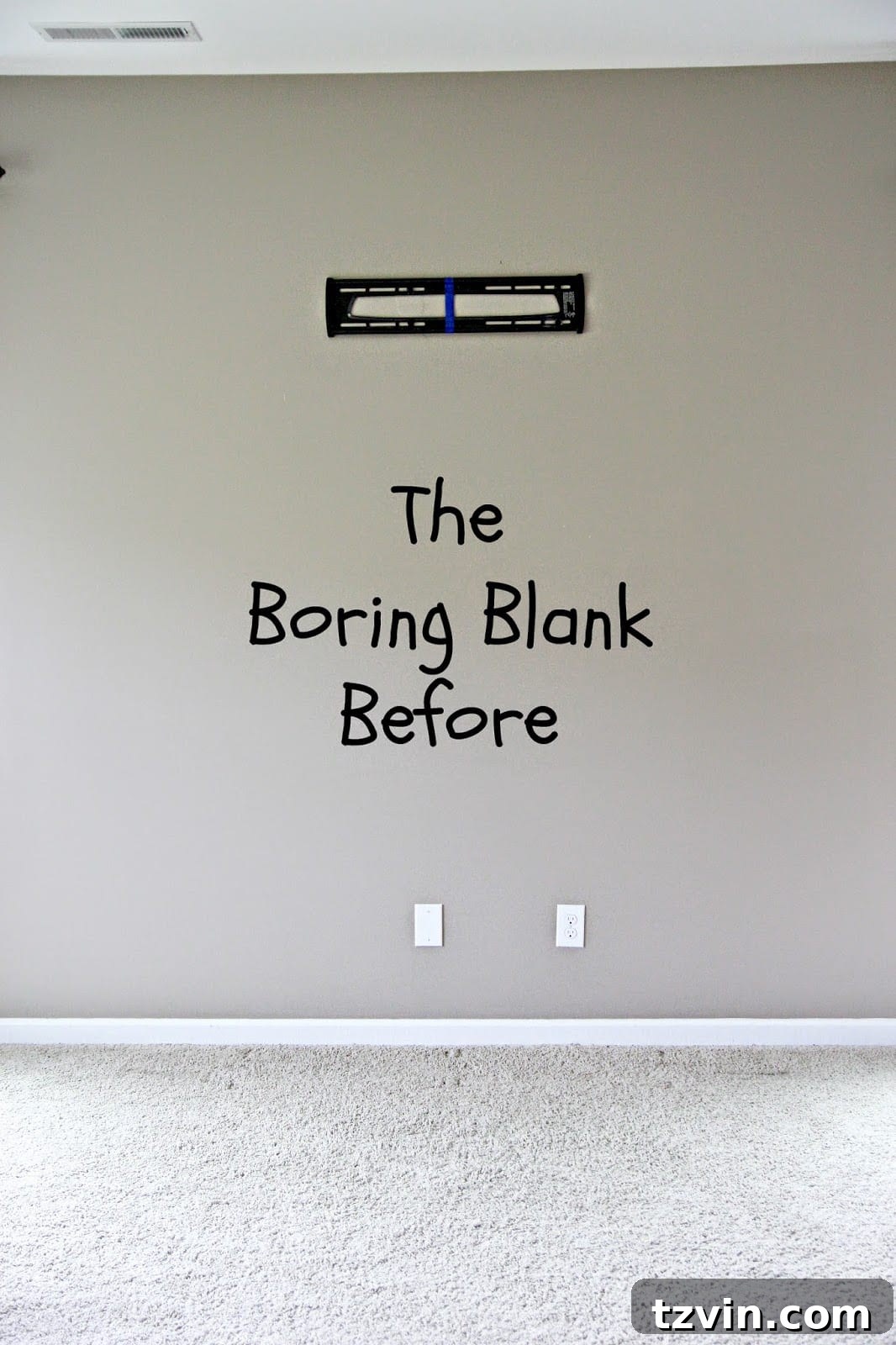 Blank wall after removing shelves, ready for faux fireplace
