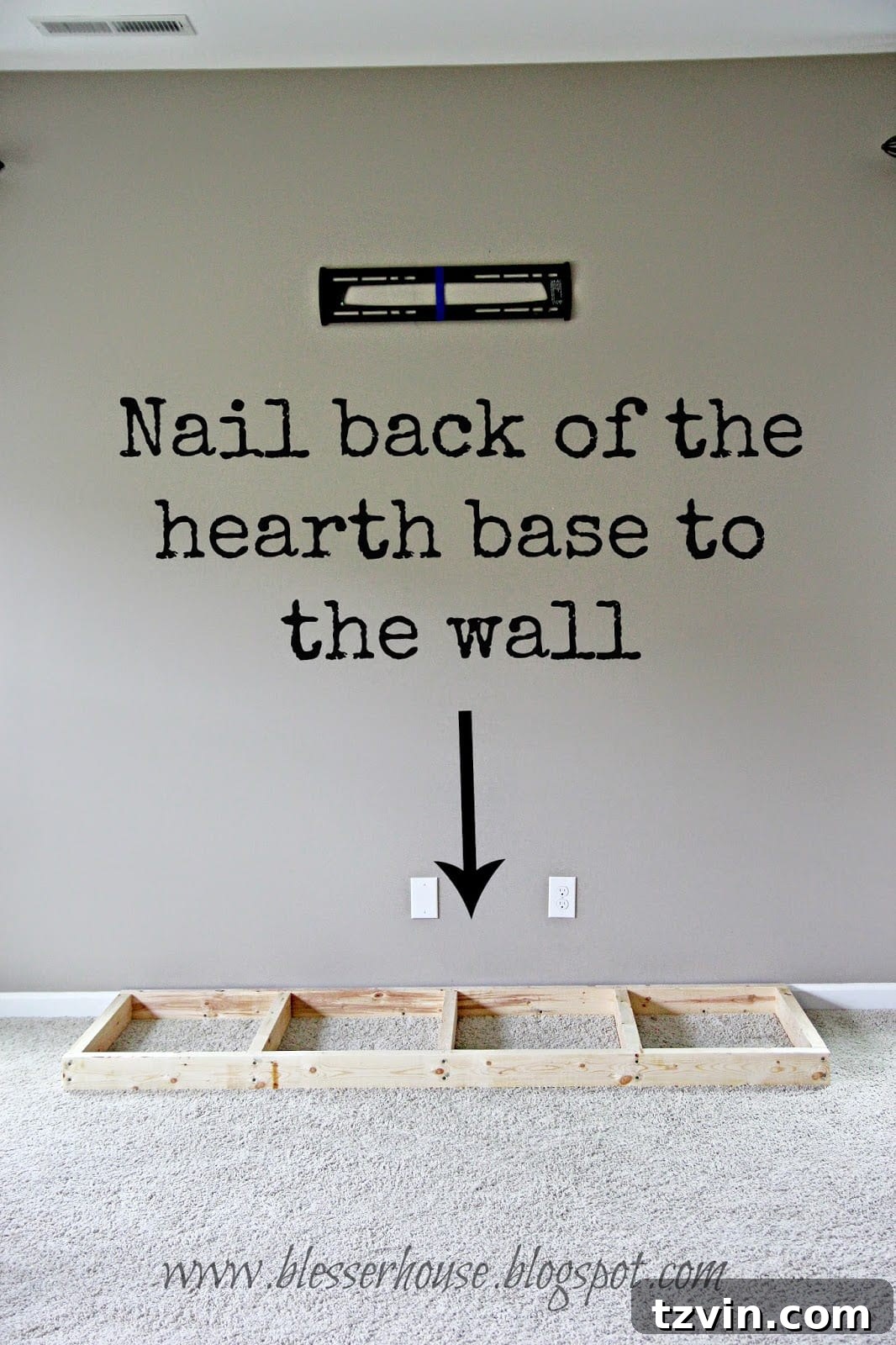 Hearth base frame securely anchored to the wall