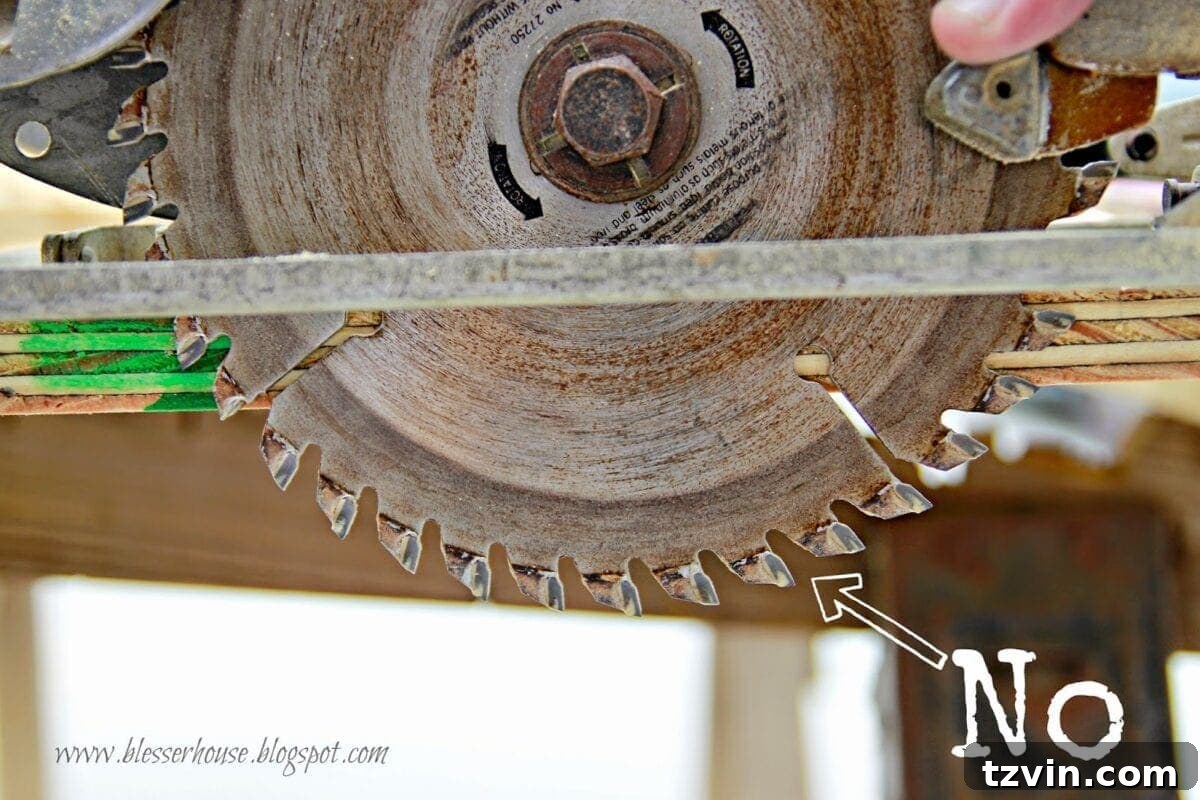 Close-up of circular saw cutting plywood