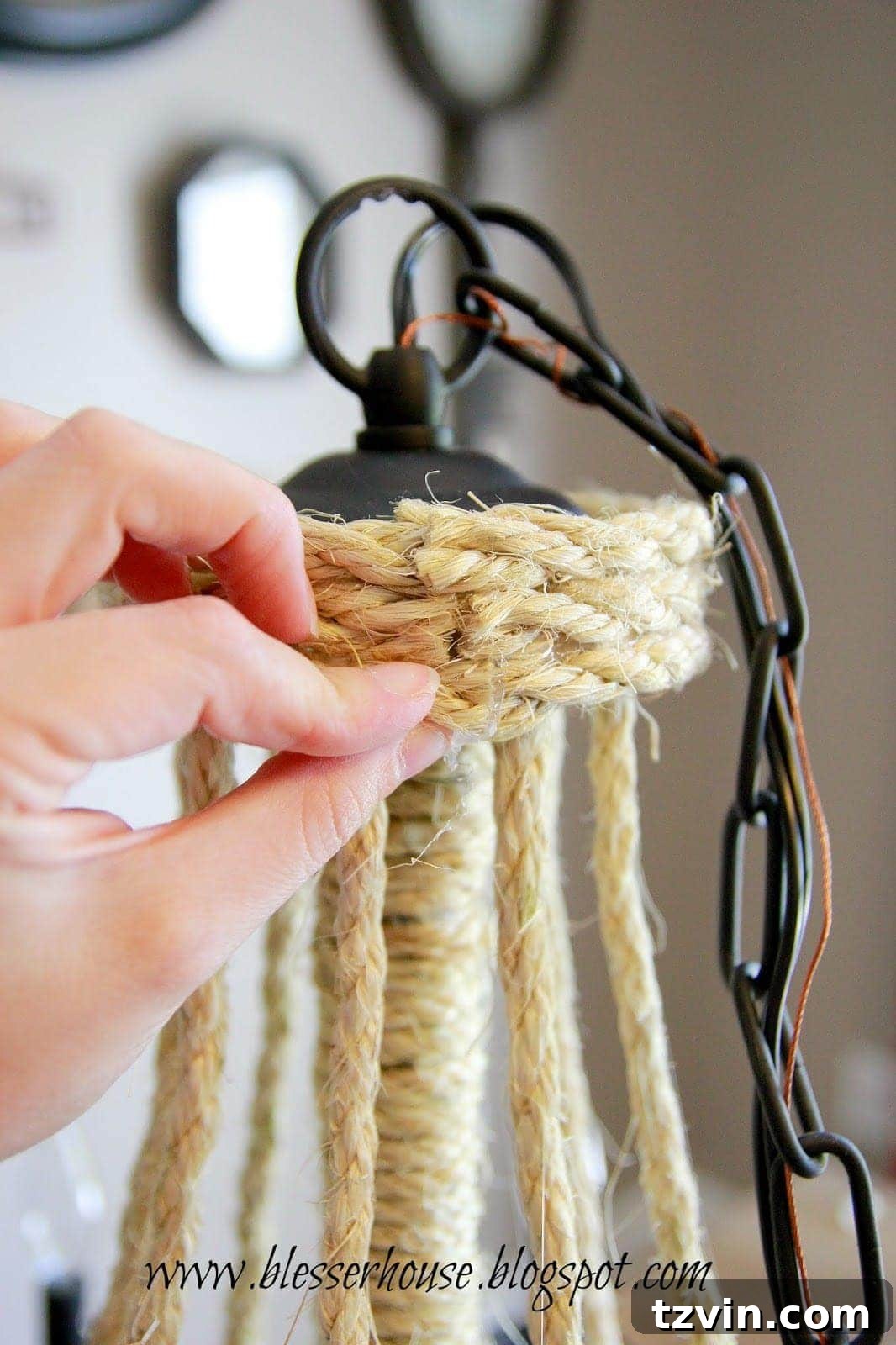 The top of the chandelier with additional rope wrapping to finish the swags