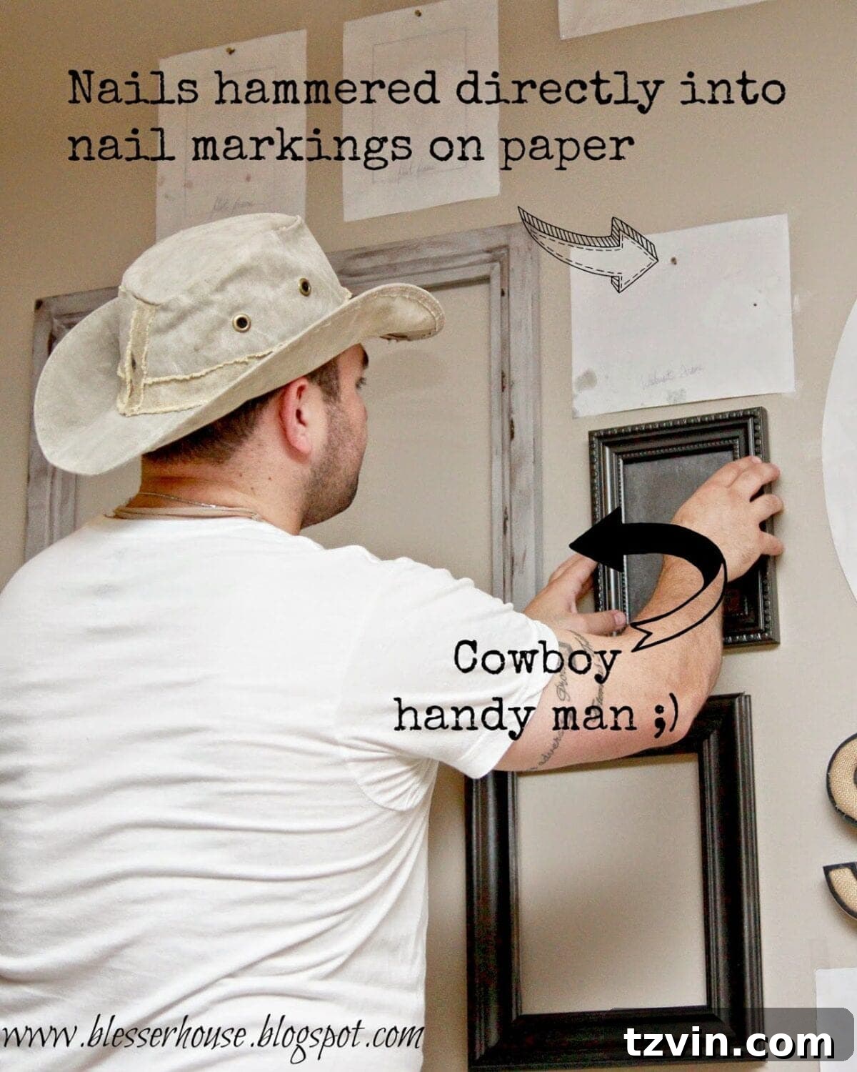 Hammering nails through paper templates on the wall