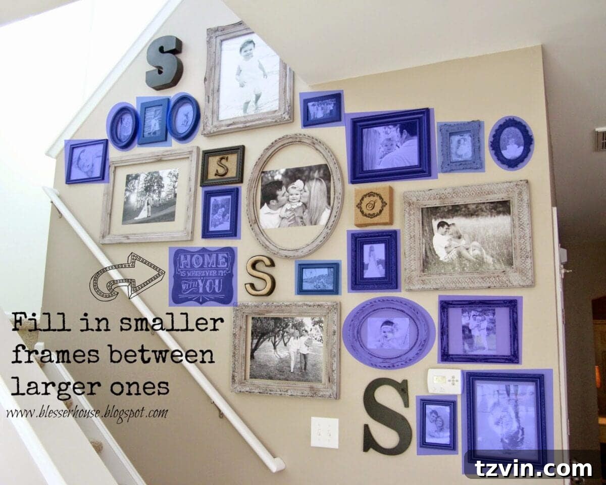 Filling in gallery wall gaps with smaller frames
