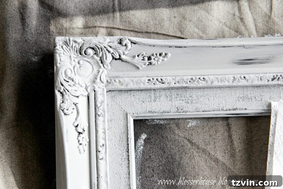 Applying Parisian Grey top coat over Vaseline-treated frame