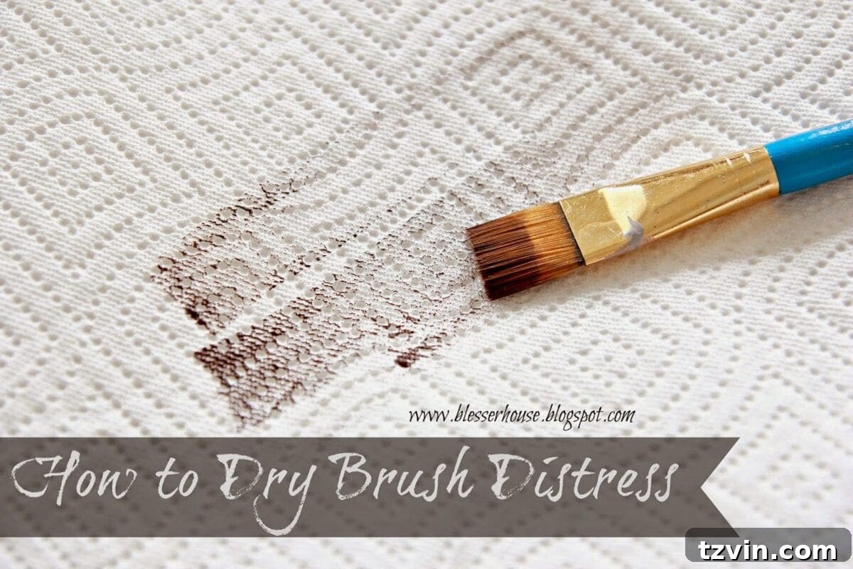 Wiping away Vaseline to reveal distressed layers on a frame