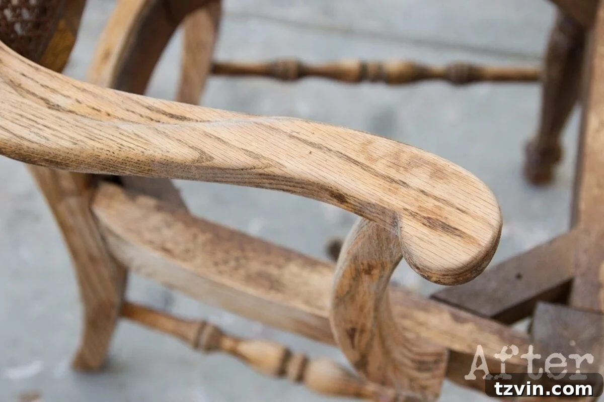 Removing Sticky Citristrip Residue from Wood Furniture 6 The same chair leg after treatment with denatured alcohol, showcasing a remarkably clean and gunk-free wood surface, ready for refinishing.