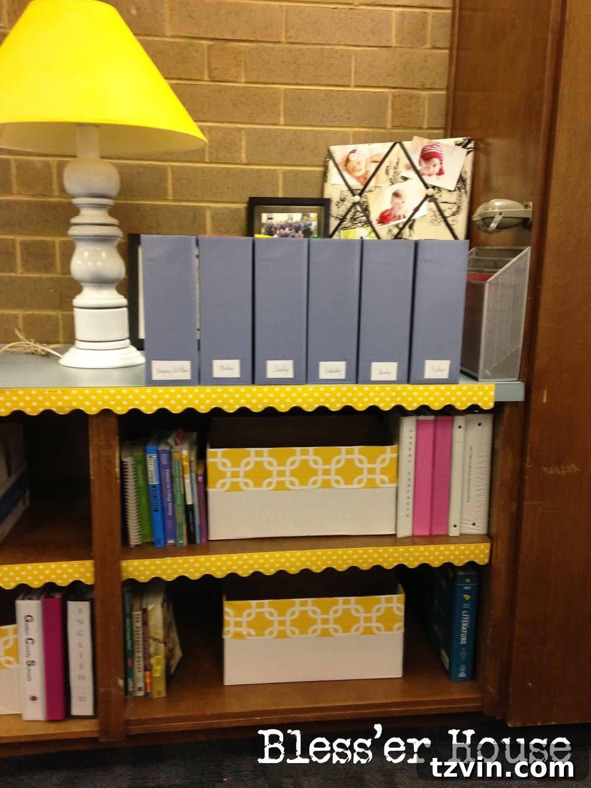 Organizers for copies and lesson plans in a classroom corner.