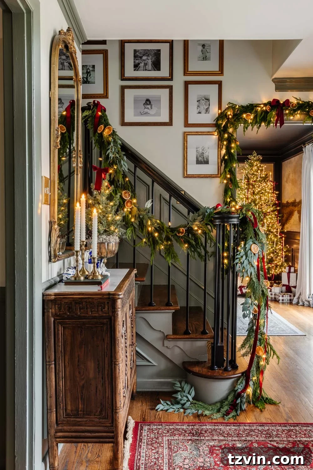 Colonial Christmas decor in an entryway with doorway garland