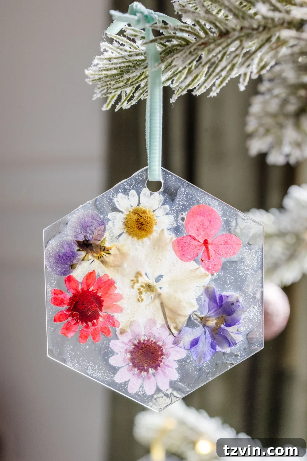 Adding ribbon to pressed flower ornament