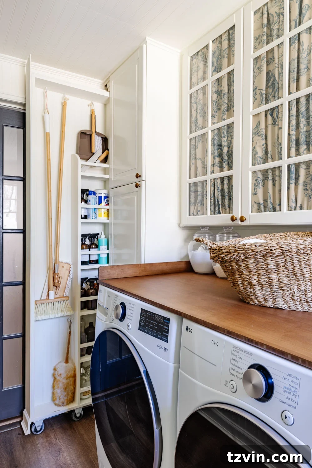 Hidden DIY broom cupboard and cleaning supply storage in a laundry room
