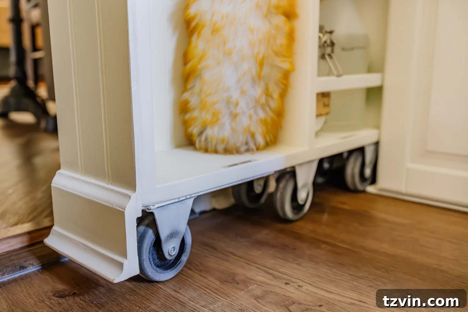 Hiding casters with baseboard trim