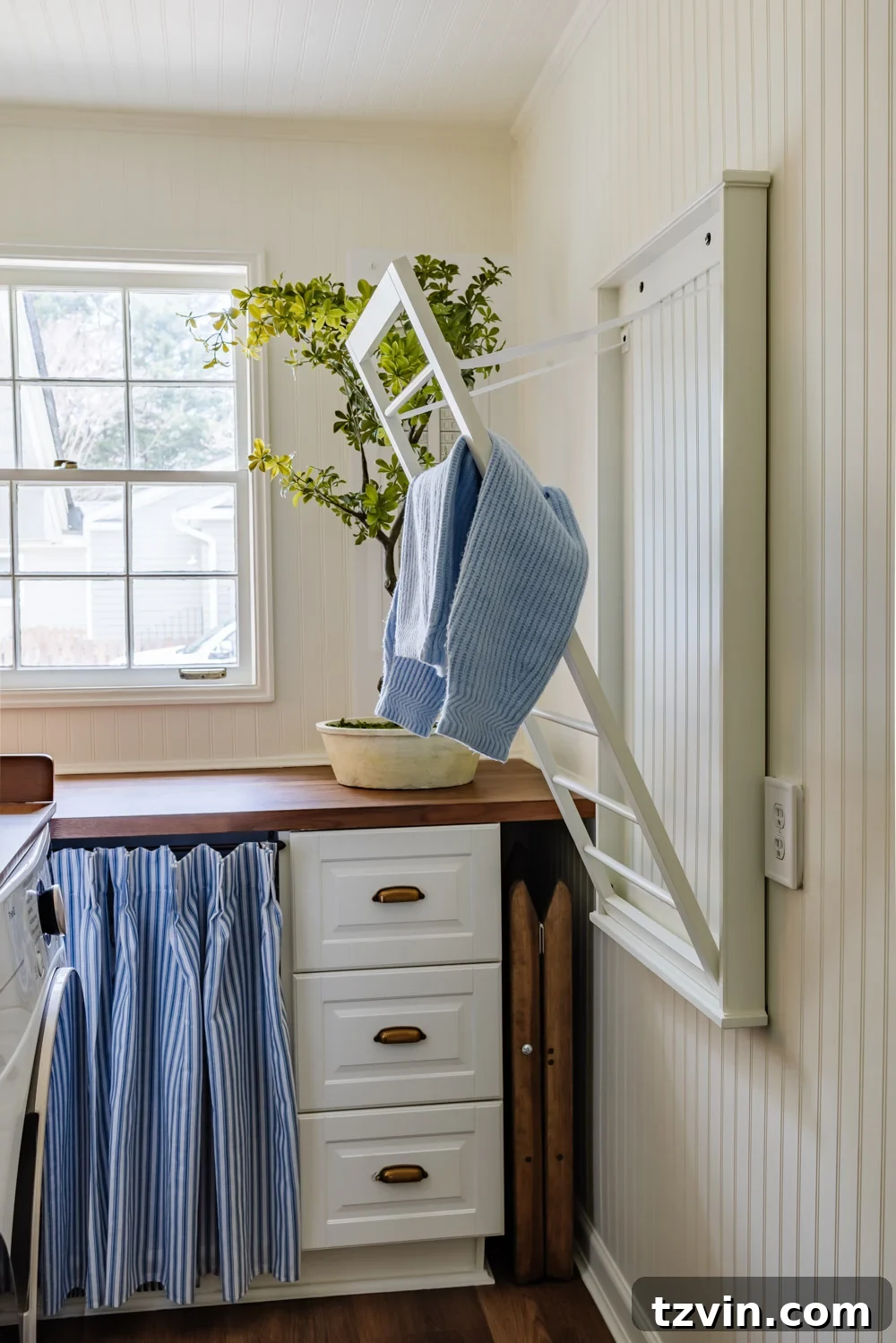 Maximizing Storage in Your Compact Laundry Room: Clever Organization Tips 19 Wall-mounted drying rack