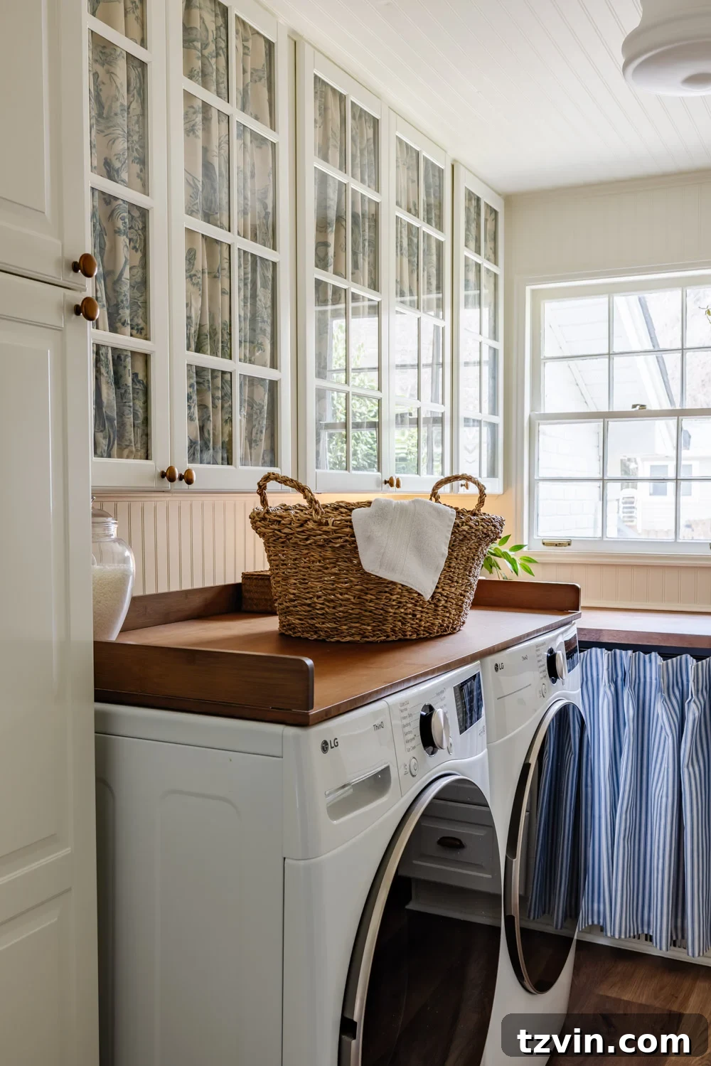Maximizing Storage in Your Compact Laundry Room: Clever Organization Tips 5 Small laundry room organization with fabric-covered cabinet doors
