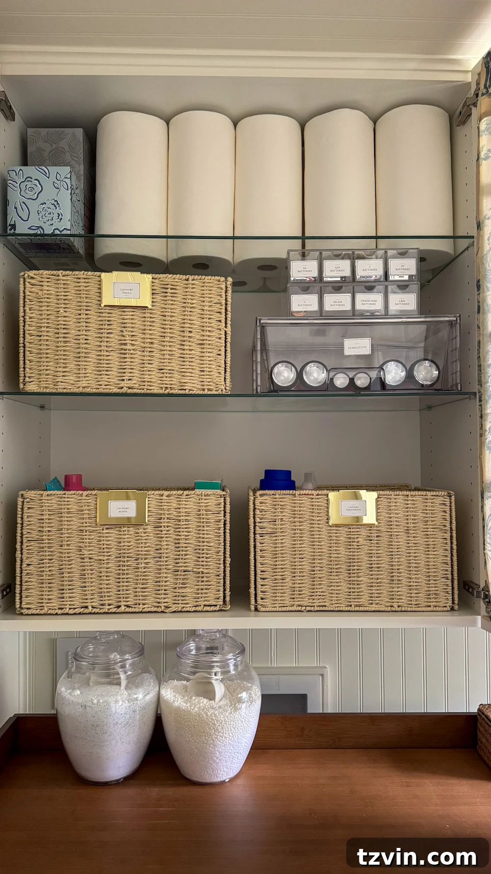 Maximizing Storage in Your Compact Laundry Room: Clever Organization Tips 6 Laundry cabinet with labeled baskets for detergents and tools