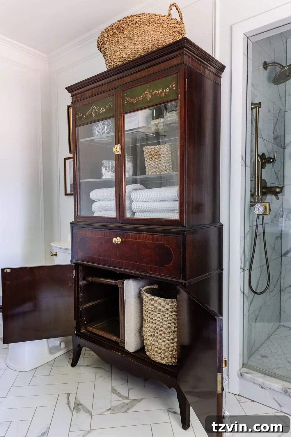 Repurposing a Secretary Desk: A DIY Makeup Vanity for Our Small Bathroom 9 Interior of an open secretary desk, showing a perfectly organized makeup vanity with a light-up mirror, makeup brushes, and a mini lamp, tucked into a small bathroom.