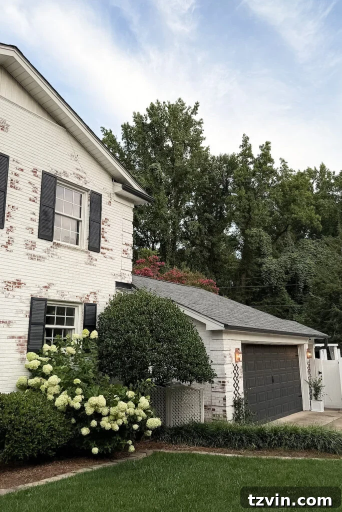 4 Garage Upgrades That Boost Curb Appeal 13 garage curb appeal with copper lanterns, star jasmine, and outdoor trash can hiding panels