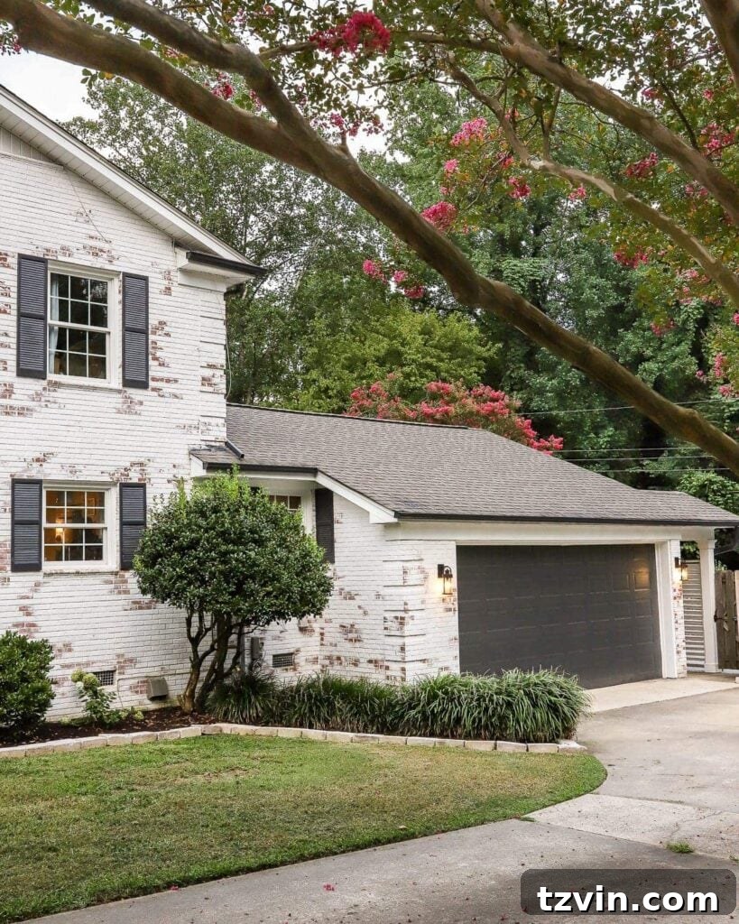 4 Garage Upgrades That Boost Curb Appeal 3 garage curb appeal with copper lanterns, star jasmine, and outdoor trash can hiding panels