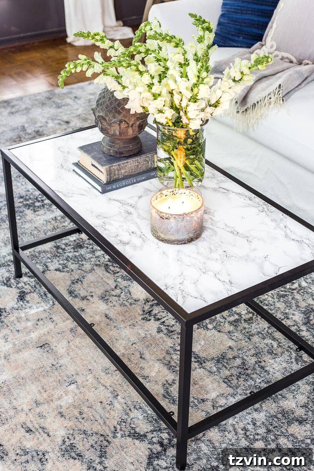 12 Furniture Upgrades That Make Your Pieces Look Expensive 23 faux marble contact paper coffee table top