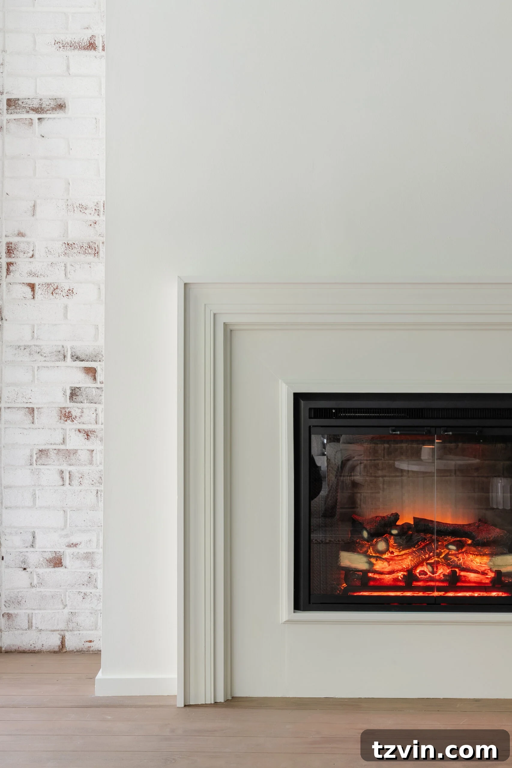 13 Stylish Electric Fireplaces That Actually Look Great 5 electric fireplace in a diy plaster surround