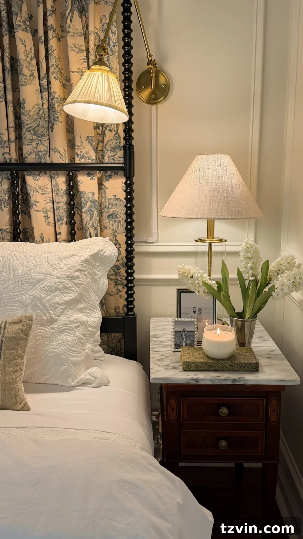 classic modern french country bedroom with layered lighting and canopy bed